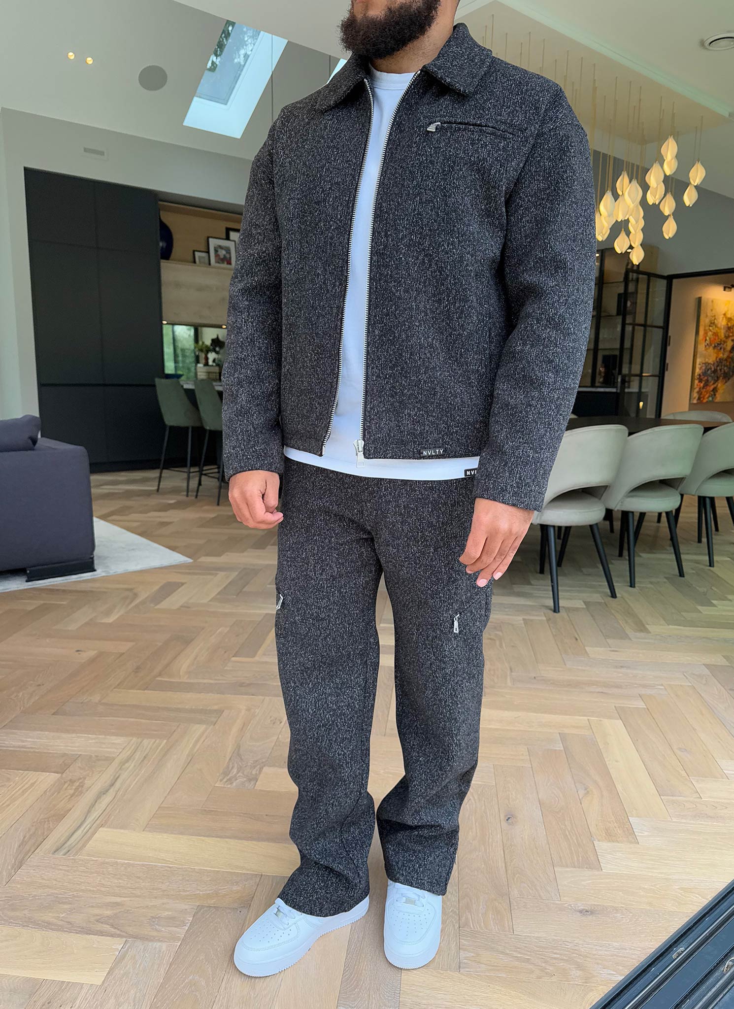 Strukturierte Reißverschlussjacke aus schwerer Wolle - Schwarz