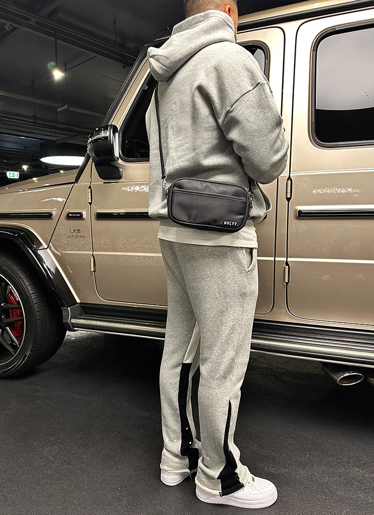 Umhängetasche mit Reißverschluss und Logo - Schwarz