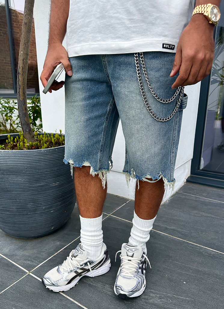 Vintage Jeansshorts mit ungesäumtem Saum - Blau
