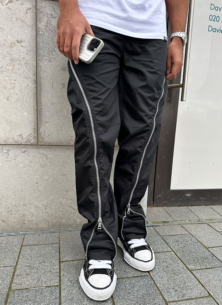 Schlaghose aus Nylon mit Reißverschluss - Schwarz